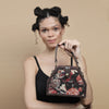 Image of Floral trapezium sling bag by gonecase