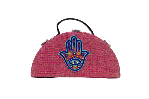 order our Hamsa Pink Half Round Embroidered Jute Bag from Gonecase