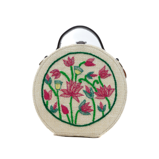 Lotus hand embroidered round jute bag by gonecase