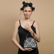 Monochrome trapezium sling bag by gonecase