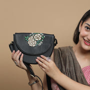 Floral hand embroidered black lune bag