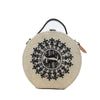 Image of Warli Art hand embroidered round jute bag by gonecase